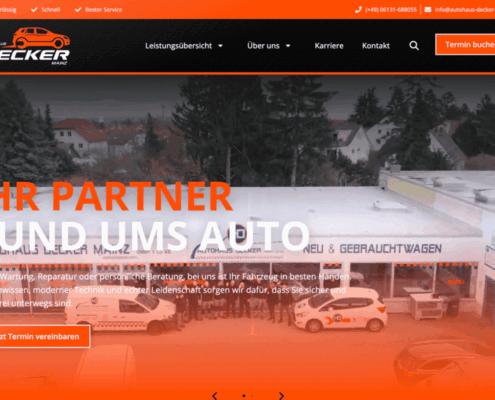 Startseite des Autohaus Decker Mainz mit der Schlagzeile „Ihr Partner rund ums Auto“. Das Hintergrundbild zeigt die Außenansicht des Autohauses mit Firmenfahrzeugen und dem Slogan für ehrliche Arbeit.